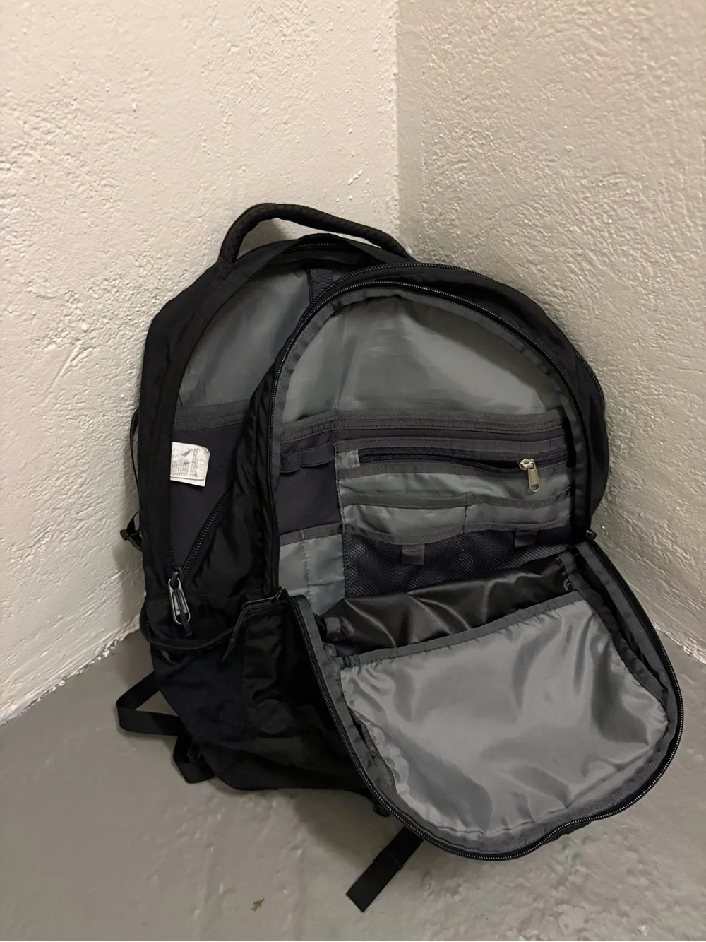 The North Face Black Padded Daypack with Front Logo